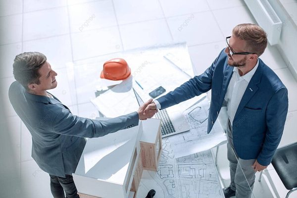 pngtree-architects-seal-a-deal-professionals-handshake-in-workplace-photo-image_46648066